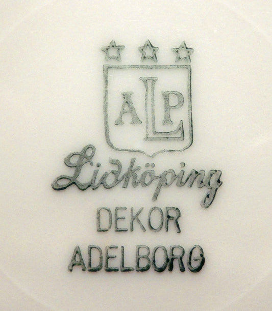リードヒェーピングALPのバックスタンプ｜三つ星の紋章とDEKOR ADELBORGの文字