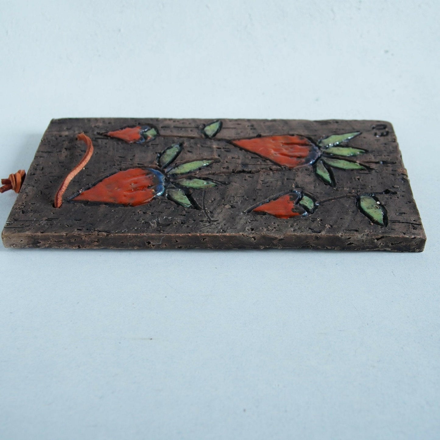 ティルグマン窯「オレンジ色の果実」の陶板 - 北欧食器Tacksamycket